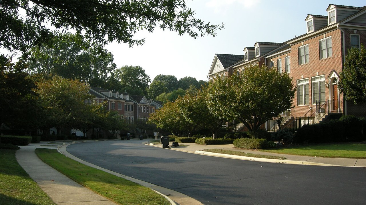 A residential street of brick townhouses in Oakton, Virginia
