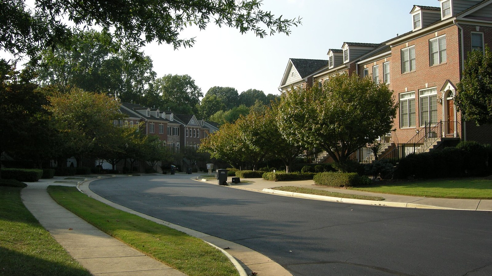 A residential street of brick townhouses in Oakton, Virginia